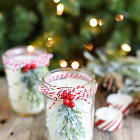 DIY Peppermint Candles - you won't believe how easy it is to make your own mason jar candles! These make a great Christmas gift idea!