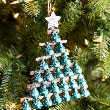 Kisses Christmas Tree - how to make a Christmas tree with Hershey's KISSES and tree branches.