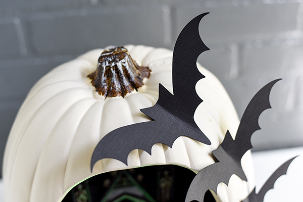 DIY Pumpkin Diorama - create a spooky graveyard entrance pumpkin diorama with flying bats.