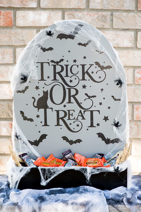 DIY Halloween Candy Holder – create a Tombstone Candy Holder out of a 2x2 piece of plywood and paint!