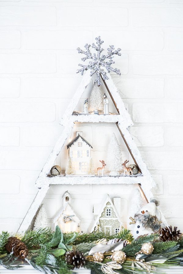 Winter Wonderland Holiday Tree Shelf – how to make a snowy cabin inspired holiday tree shelf with a mini Christmas village.