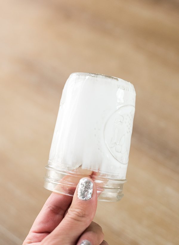 DIY Snowy Mason Jars – create faux snow-covered mason jar luminaries for the holiday season