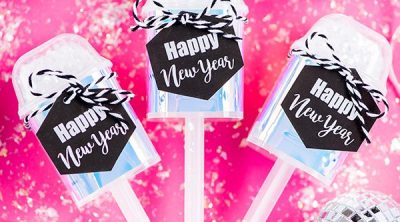 DIY Holographic Confetti Push Up Pops – create mini confetti push up poppers with mirrored tape and printable tags for your New Year’s Eve party.