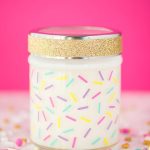 How to make birthday cake scented candles. Soy wax candles made in a jar and decorated with adhesive vinyl sprinkles.