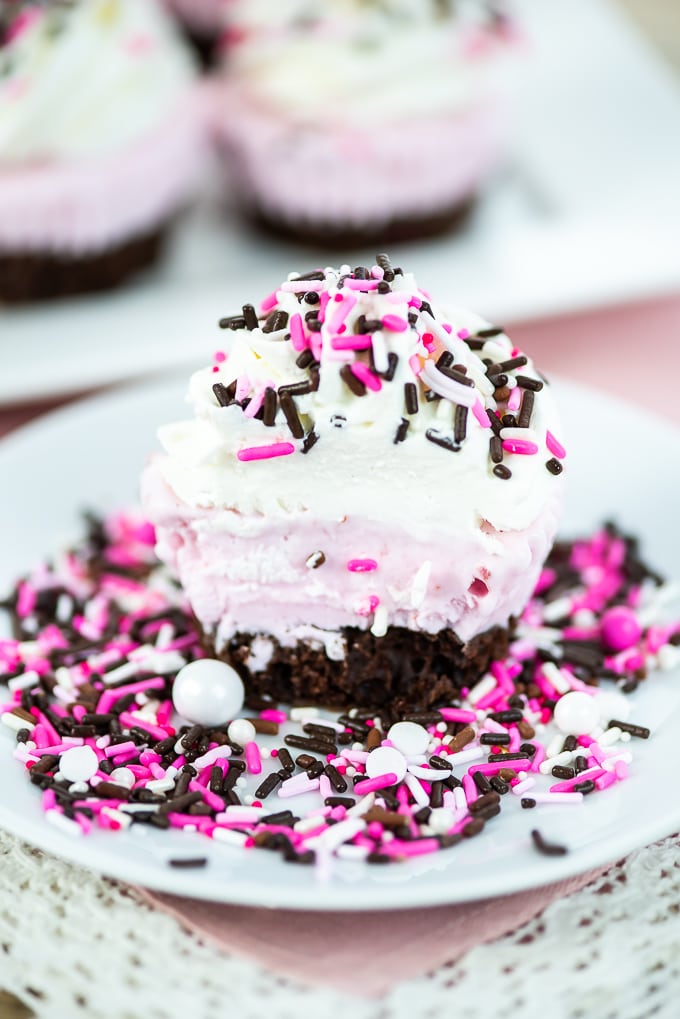 Ice Cream Cupcakes layered with chocolate cake, strawberry ice cream and whipped cream