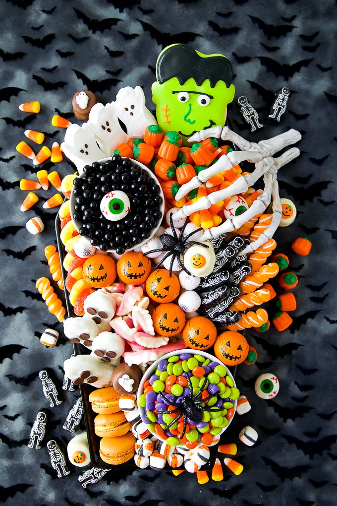 Create a festive Halloween Candy Charcuterie Board on a coffin platter filled with Halloween treats. Perfect for a Halloween party or movie night!