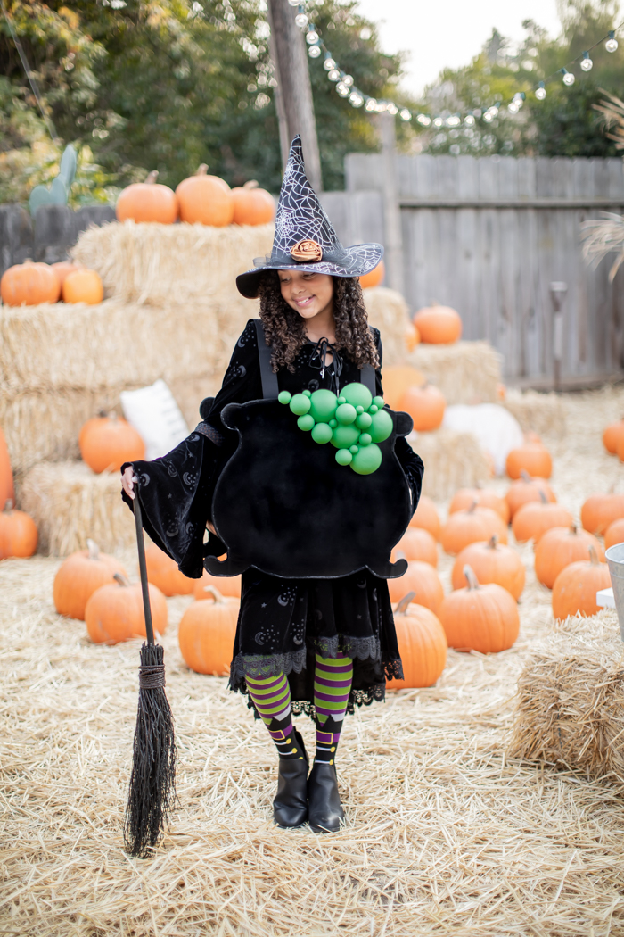 easy handmade no-sew Halloween witch costume with bubbling cauldron