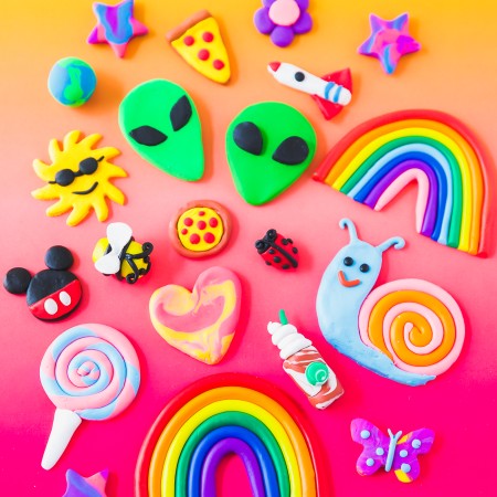 colorful clay eraser designs with a rainbow, Mickey Mouse, and lollipop