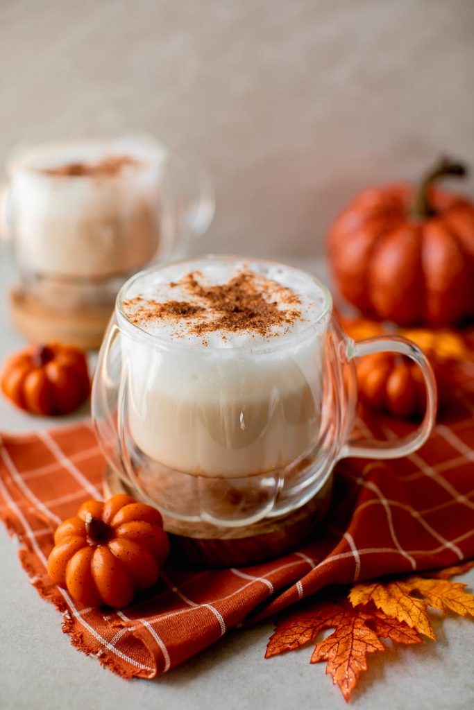 simple and pumpkin latte in a pumpkin mug