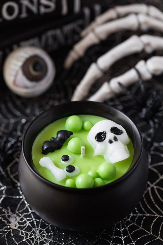 green witchs' brew cauldron candle