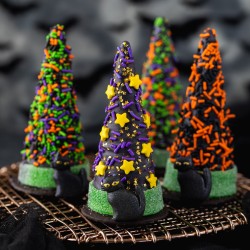waffle ice cream cone covered in chocolate and decorated with Halloween sprinkles