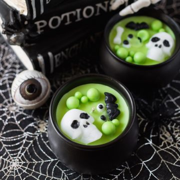 black and green cauldron Halloween candle