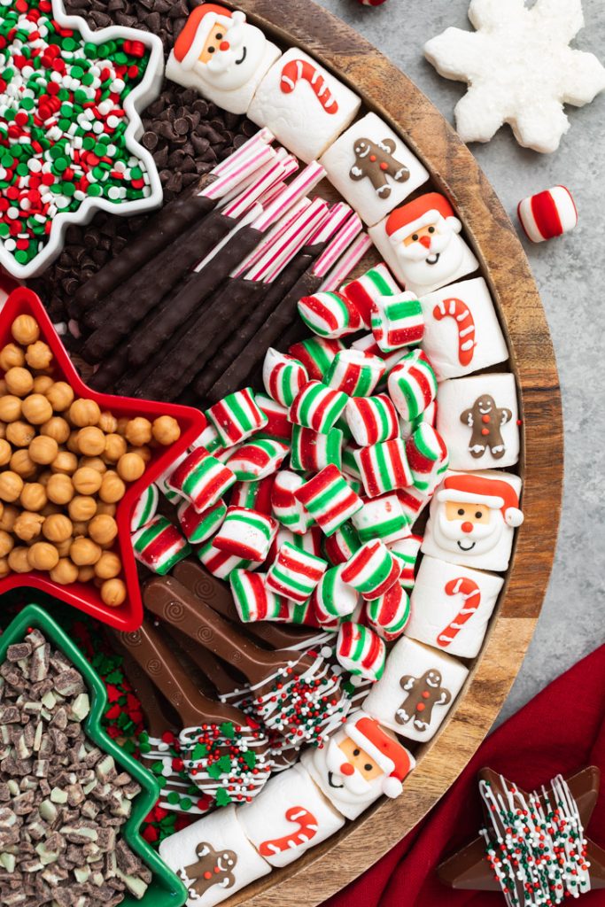 Christmas decorated marshmallows displayed on hot cocoa tray