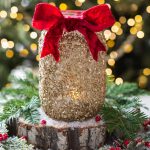 gold crushed glass decorated mason jar with red velvet bow