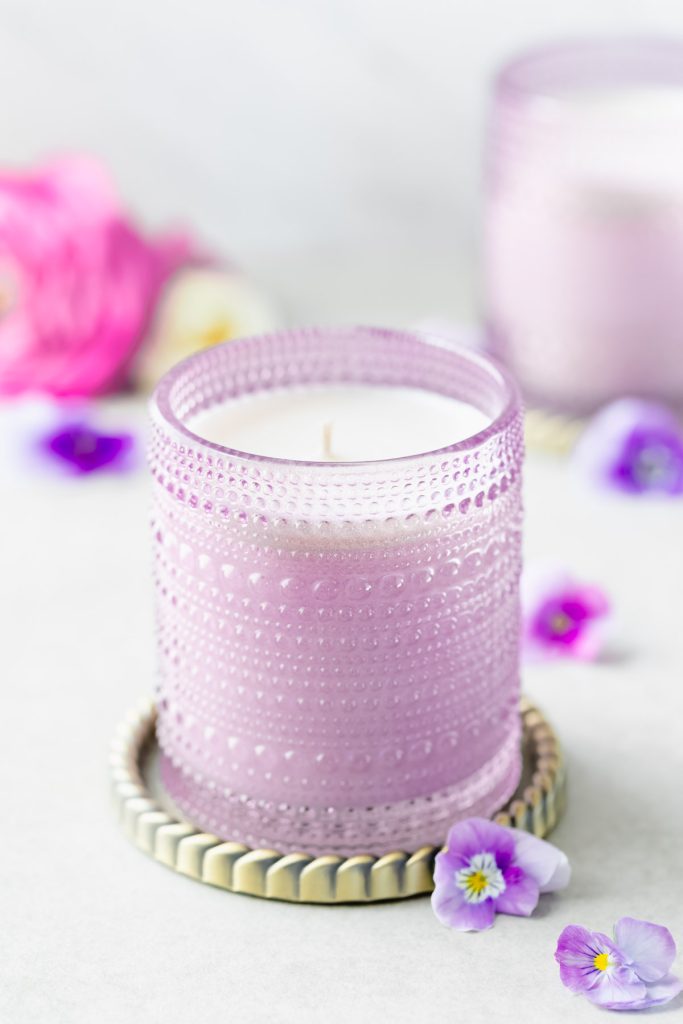 hand poured soy wax floral scented candle in purple jar