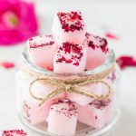 pink rose petal sugar scrub cubes in a mason jar