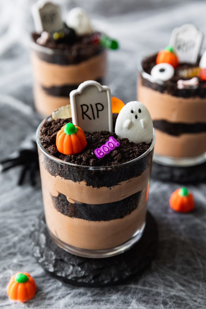 chocolate pudding cups with Halloween candy