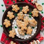 chocolate oreo truffle recipe shaped into gingerbread men covered in candy coating