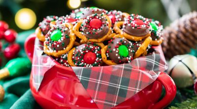sweet and salty Rolo pretzel bites with festive holiday sprinkles