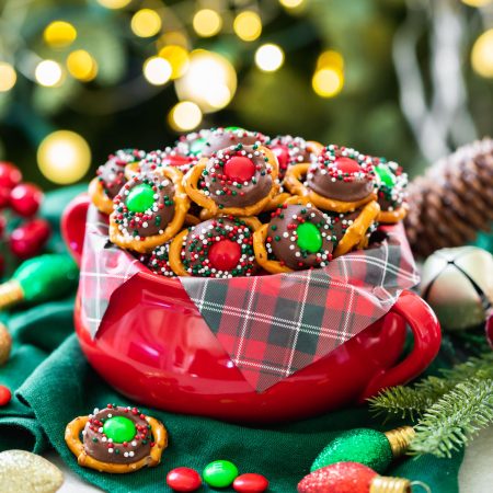 sweet and salty Rolo pretzel bites with festive holiday sprinkles