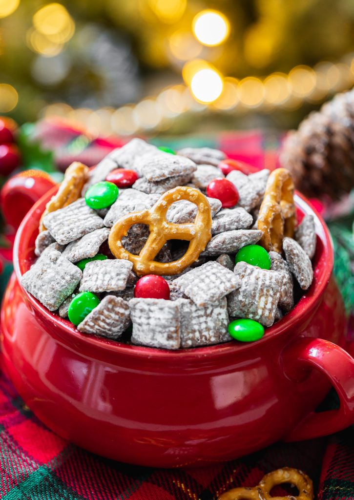 chocolate peanut butter Chex muddy buddies with red and green M&Ms