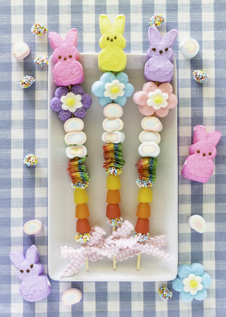 DIY Easter candy stick kabob made with marshmallow Peeps bunny, flowers, and candy strips